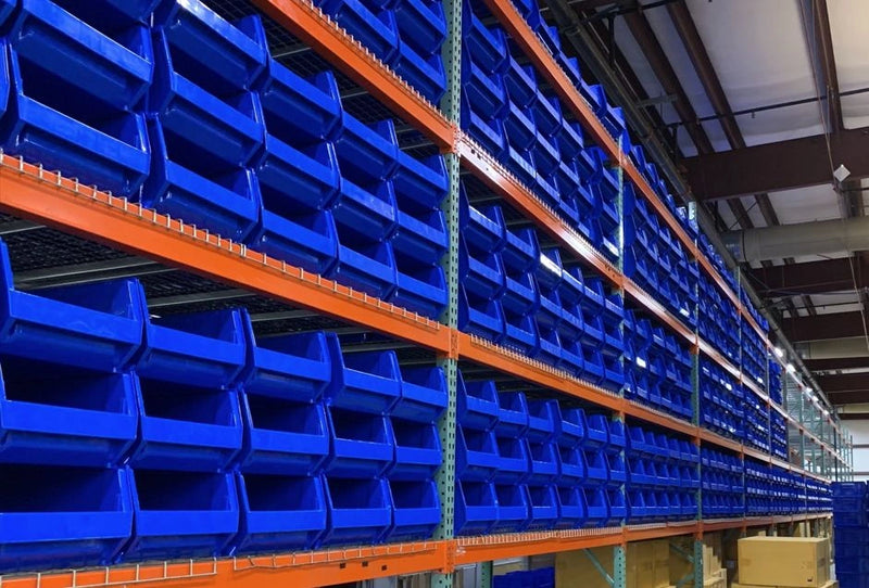 Stackable Bins on Warehouse Shelves