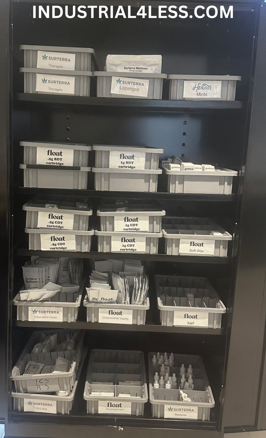 Dividable containers organized inside a storage cabinet.