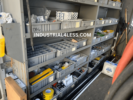 Gray dividable grid containers with dividers organizing plumbing parts in a service truck 2