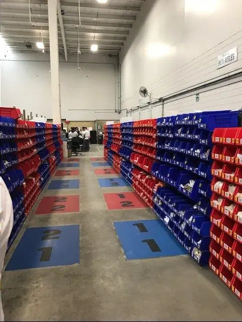 Large Stacking Bins Line Warehouse Walls